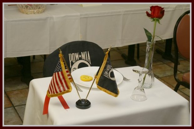 A photograph of a small table set as described in the remembrance ceremony.
